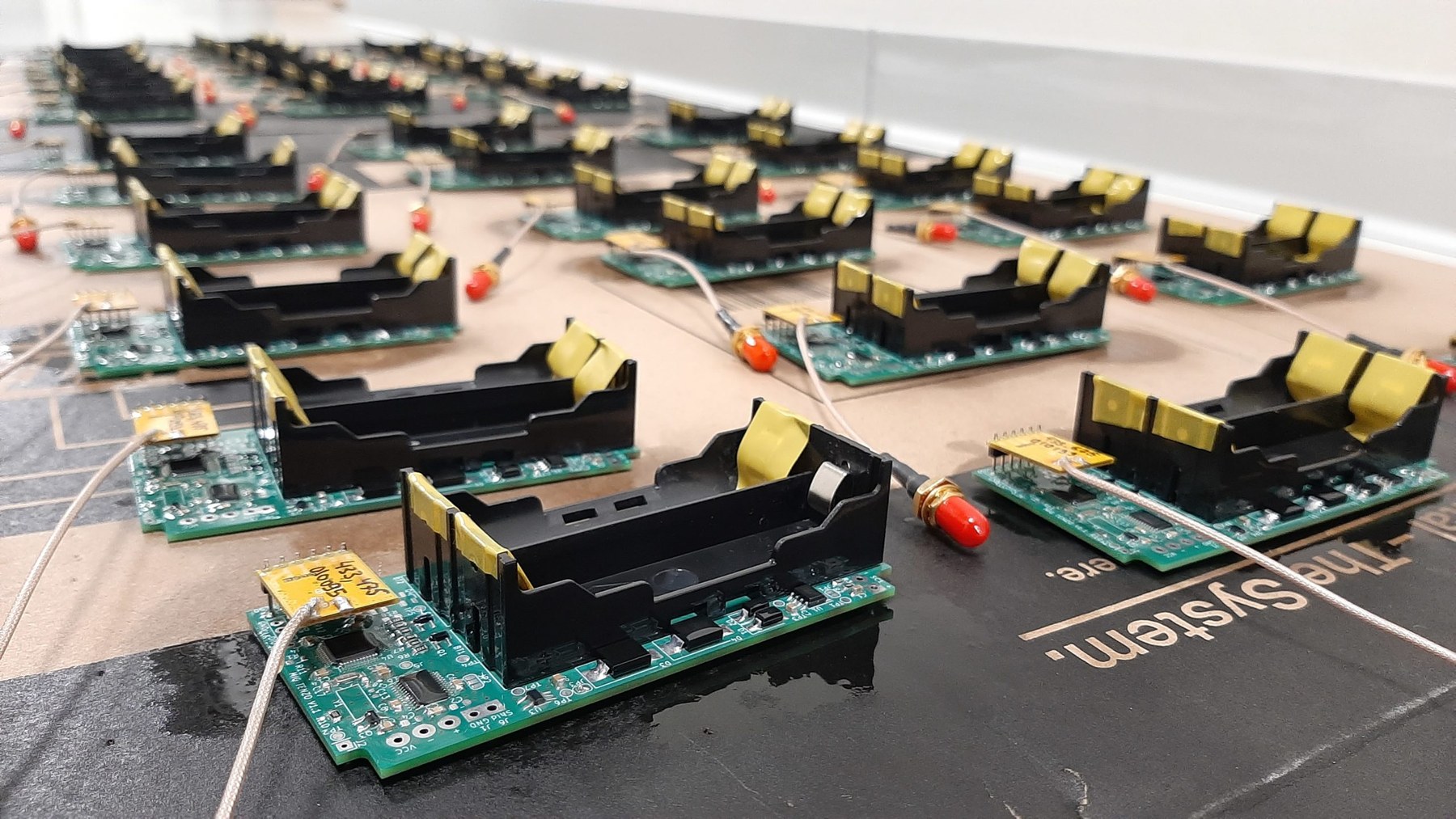 Production of measurement boards with radio communication: conformal coating drying