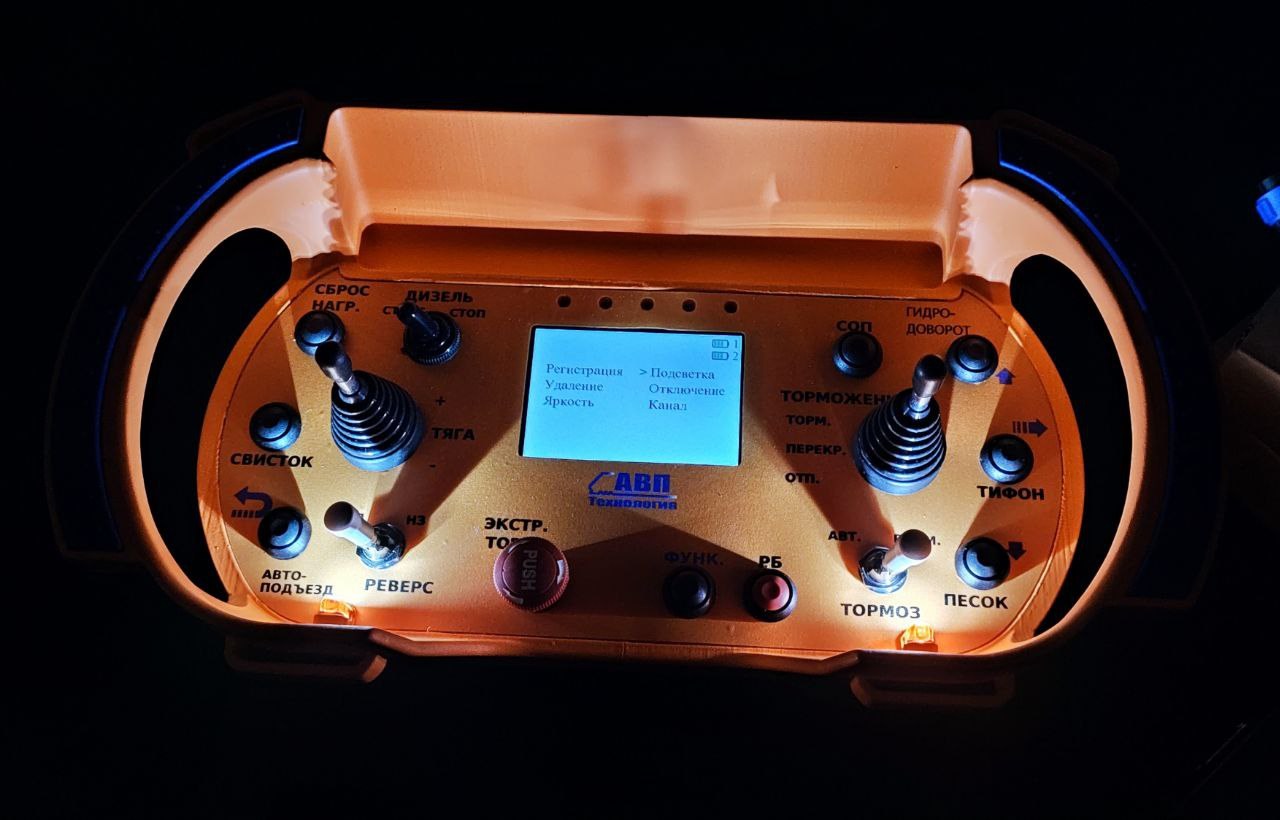Locomotive remote-control console at night with backlighting on