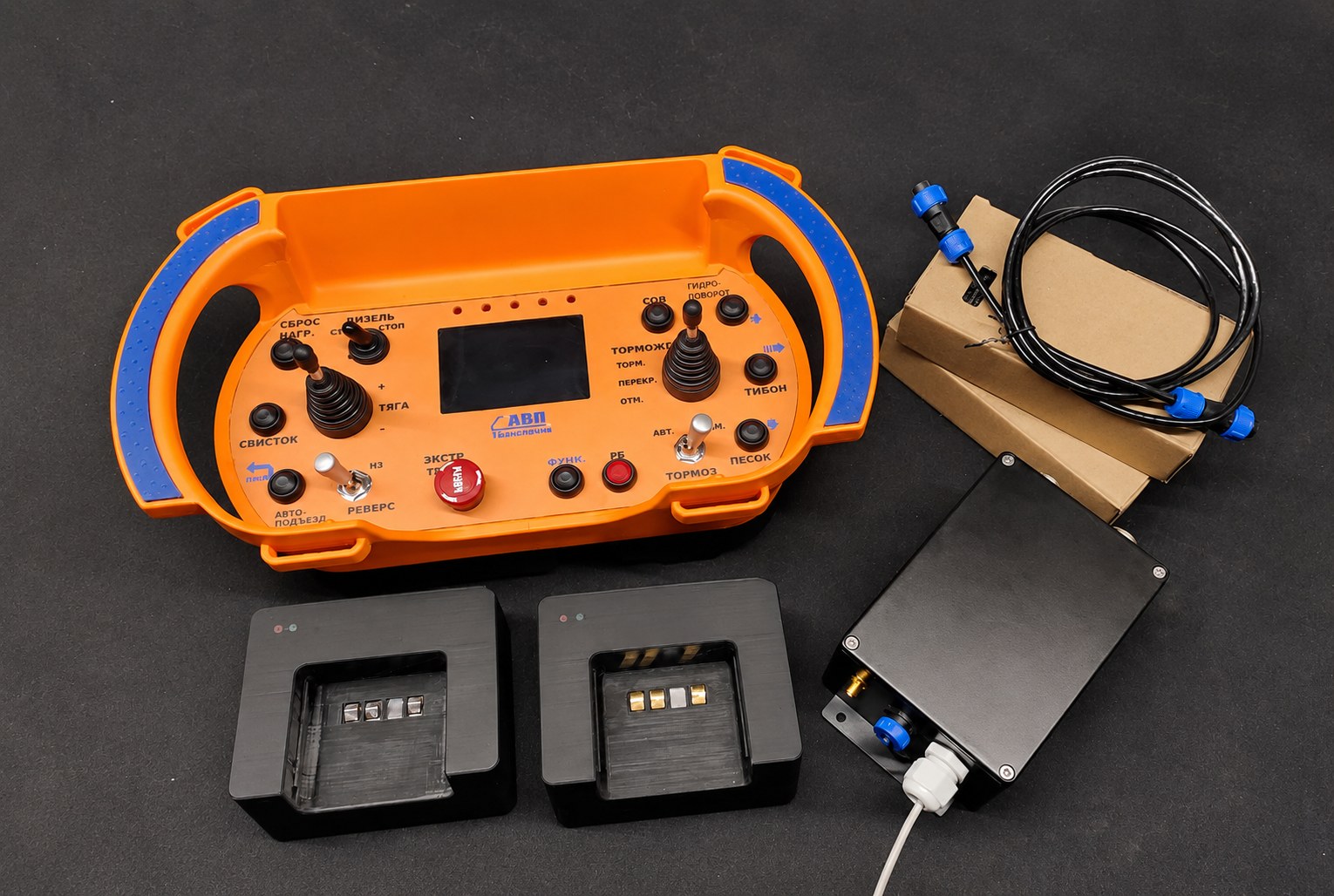 Locomotive remote-control console, onboard module and battery charging units
